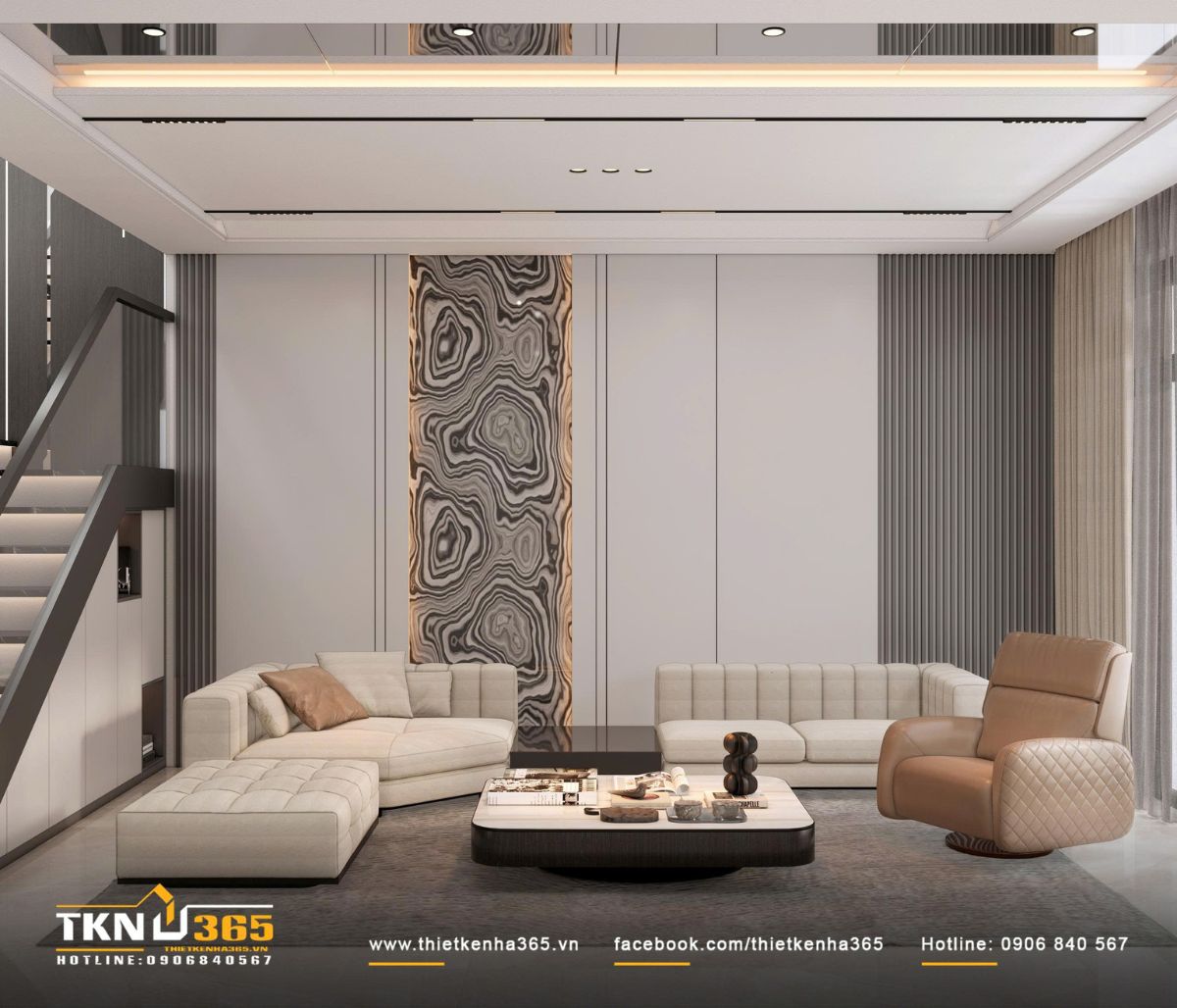 Mảng đ&aacute; v&acirc;n khổ lớn đặt theo trục đứng trở th&agrave;nh điểm nhấn trung t&acirc;m, định h&igrave;nh chiều s&acirc;u cho kh&ocirc;ng gian ph&ograve;ng kh&aacute;ch