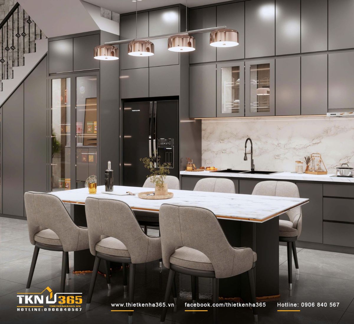 Tổng thể kh&ocirc;ng gian bếp - ăn nổi bật với hệ tủ kịch trần phẳng m&agrave;u x&aacute;m đậm kết hợp đ&aacute; trắng v&acirc;n m&acirc;y, tạo n&ecirc;n sự tương phản r&otilde; r&agrave;ng nhưng vẫn giữ tinh thần trung t&iacute;nh xuy&ecirc;n suốt tầng trệt