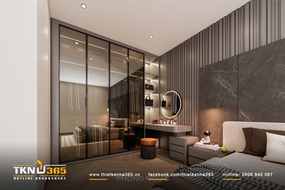 Hệ tủ quần &aacute;o v&agrave; b&agrave;n trang điểm cho thấy sự chỉn chu trong xử l&yacute; vật liệu v&agrave; &aacute;nh s&aacute;ng của thiết kế nội thất nh&agrave; phố 4 tầng