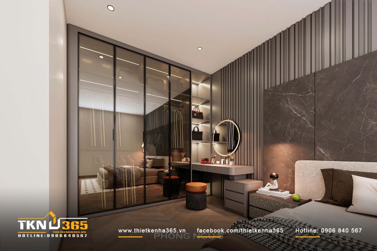 Hệ tủ quần &aacute;o k&iacute;nh khung đen phản chiếu &aacute;nh s&aacute;ng, gi&uacute;p kh&ocirc;ng gian ph&ograve;ng ngủ nhỏ trở n&ecirc;n tho&aacute;ng v&agrave; c&oacute; cảm gi&aacute;c rộng hơn