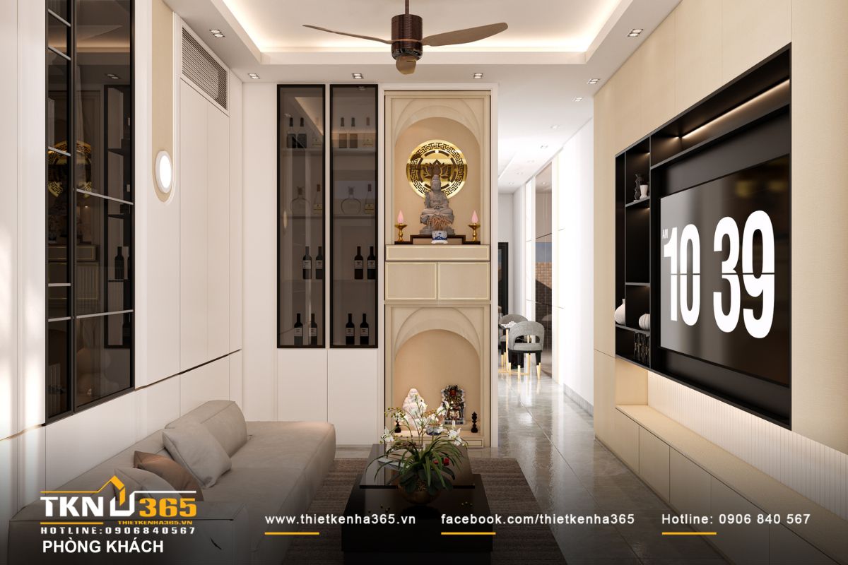 Kh&ocirc;ng gian ph&ograve;ng kh&aacute;ch tổ chức theo trục dọc mở, li&ecirc;n th&ocirc;ng bếp - ăn, trong khi khu thờ được đặt trang trọng ở trung t&acirc;m như điểm tựa tinh thần của cả gia đ&igrave;nh