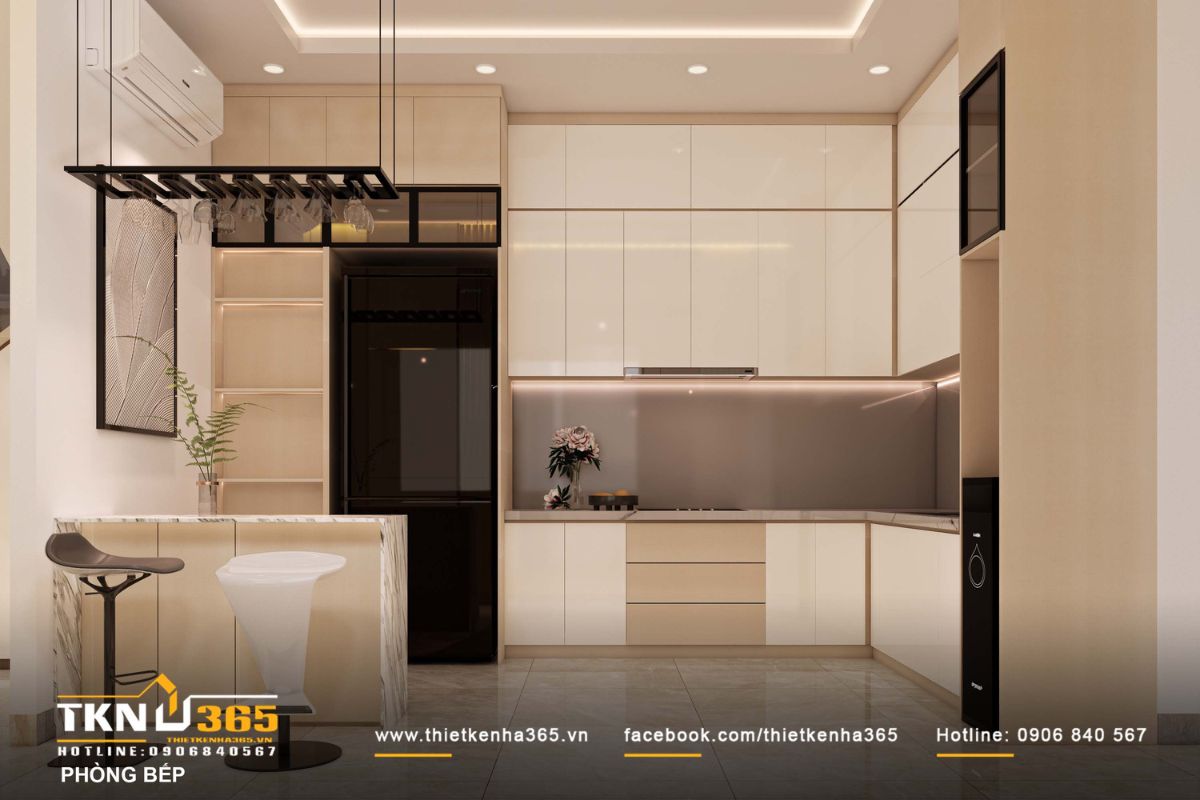 Khu bếp D&rsquo;s House thiết kế gọn g&agrave;ng với hệ tủ bếp chữ L kịch trần, phối trắng - be nhẹ nh&agrave;ng, giữ kh&ocirc;ng gian lu&ocirc;n s&aacute;ng tho&aacute;ng