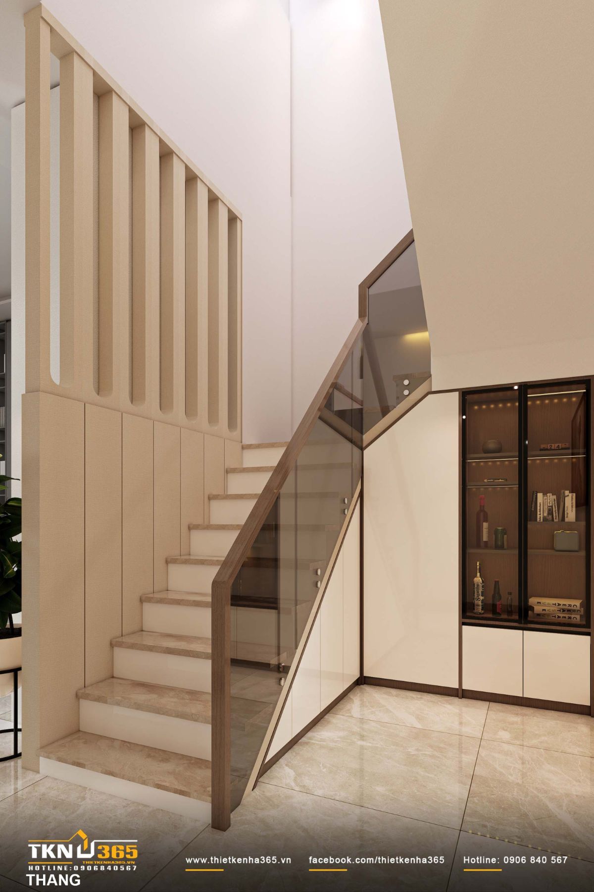 Khu vực cầu thang thiết kế gọn g&agrave;ng với lan can k&iacute;nh v&agrave; tay vịn gỗ, gi&uacute;p kh&ocirc;ng gian nhẹ tho&aacute;ng hơn, đồng thời đ&oacute;ng vai tr&ograve; như khoảng chuyển tiếp mềm mại giữa c&aacute;c khu vực chức năng theo chiều dọc