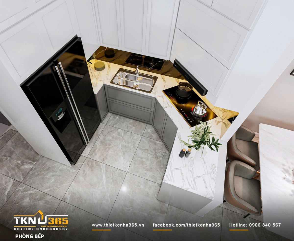 Bố cục bếp chữ L kết hợp thiết bị &acirc;m tủ v&agrave; mặt b&agrave;n liền mạch, gi&uacute;p tối ưu diện t&iacute;ch sử dụng trong mặt bằng nh&agrave; phố hẹp ngang