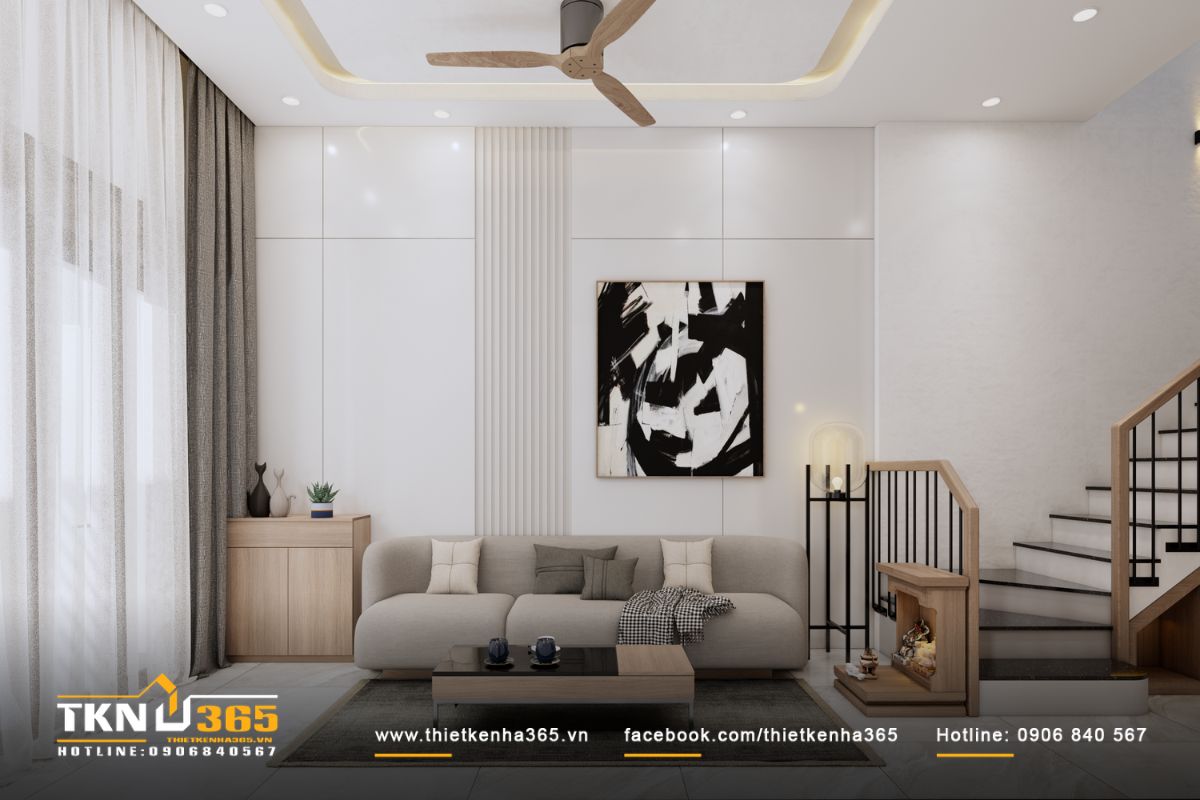 Phòng khách thiết kế gọn nhẹ với bảng màu trung tính và chất liệu gỗ, tạo cảm giác ấm áp và cân bằng ngay khi bước vào nhà