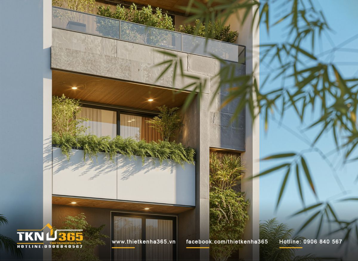 Khu vườn đứng và bồn cây giúp mặt tiền nhà phố 5 tầng trở nên mềm mại, giảm bức xạ nhiệt cho không gian bên trong