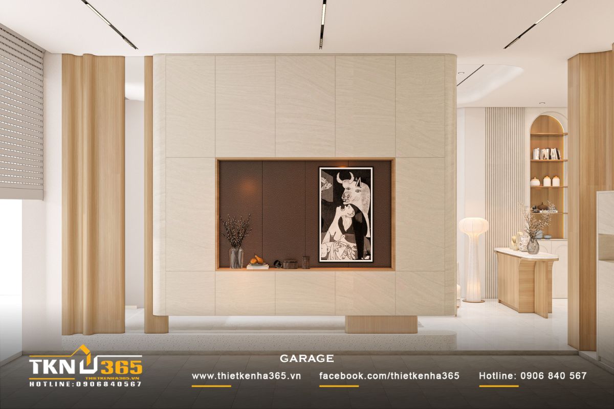 Vách tủ và mảng trang trí tích hợp giúp garage không còn là khu vực phụ trợ, mà trở thành một phần thẩm mỹ trong tổng thể nội thất