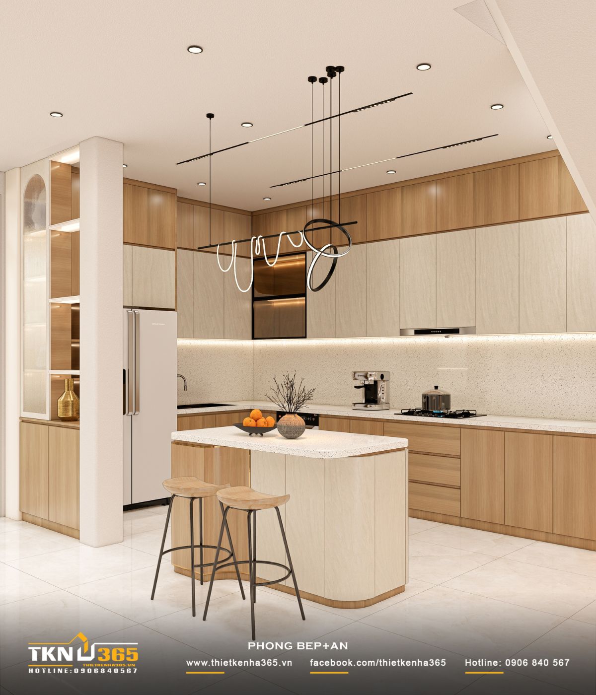 Hệ đèn thả và đèn âm trần bố trí hợp lý, đảm bảo chiếu sáng đầy đủ cho cả khu vực bếp và bàn ăn