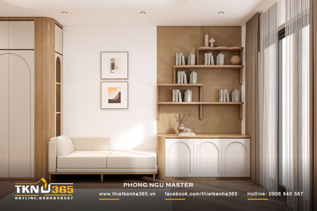 Khu vực thư giãn cạnh cửa sổ kết hợp kệ trang trí bo cong và ánh sáng tự nhiên, tạo nên một “khoảng nghỉ” yên tĩnh ngay trong phòng ngủ master