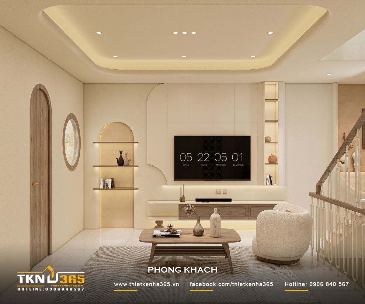 Kệ tivi phòng khách thiết kế tối giản kết hợp kệ trang trí và ánh sáng hắt, làm nổi bật chiều sâu không gian