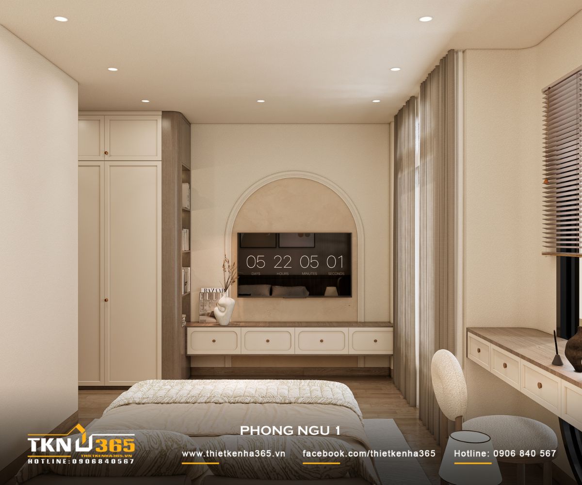 Không gian phòng ngủ 1 tổ chức gọn gàng với giường thấp, tủ lưu trữ và kệ tivi liền mạch trong cùng một ngôn ngữ tối giản