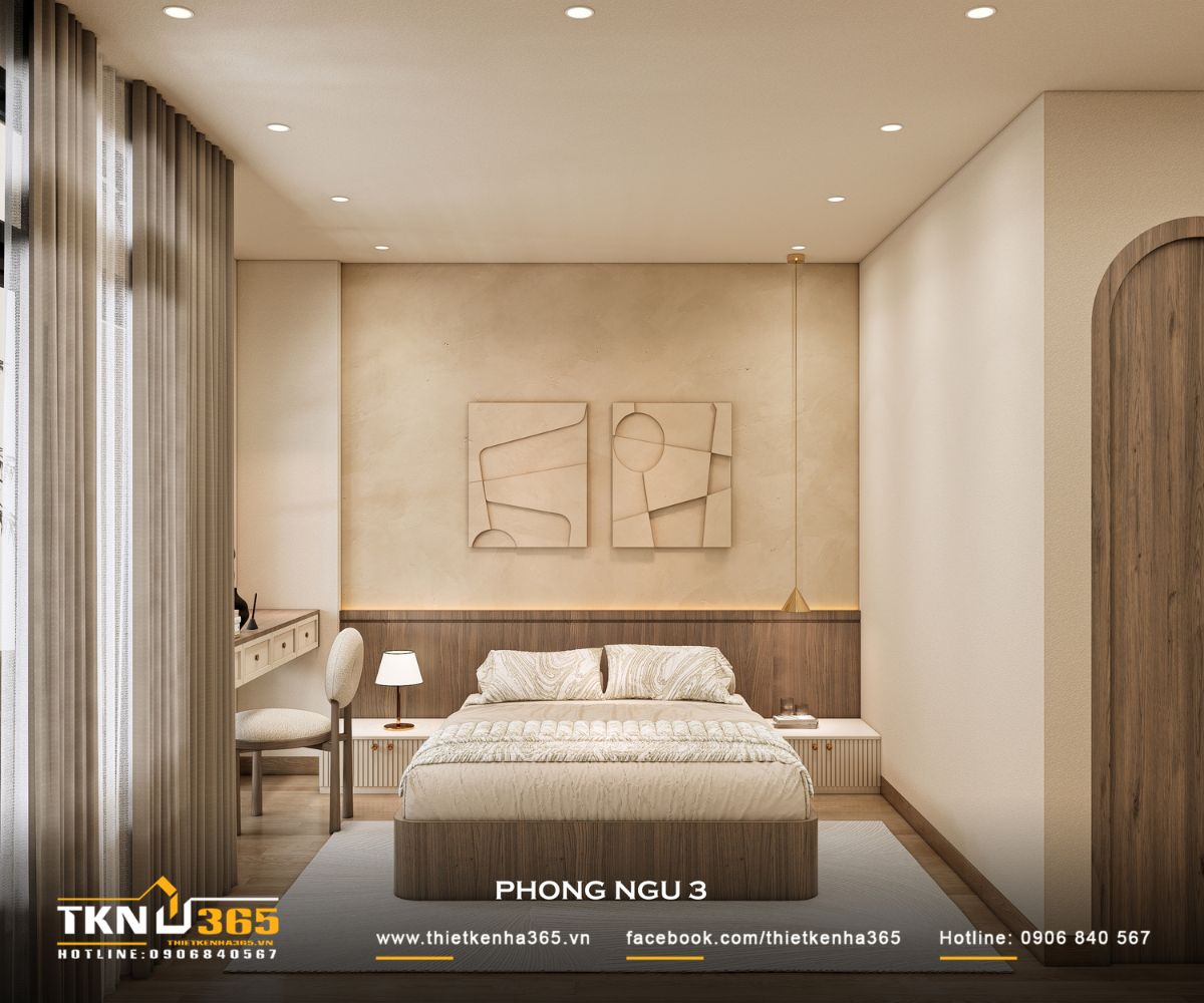 Phòng ngủ 3 trong  nhà phố 5 tầng tạo điểm nhấn bằng mảng tranh treo tường kết hợp đèn thả, mang lại cảm giác cân bằng và nhẹ nhàng cho khu vực đầu giường