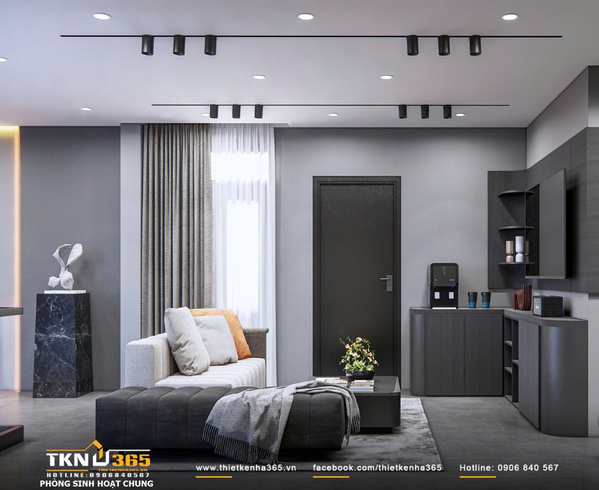 Sofa sáng màu đặt trên nền vật liệu trầm giúp làm mềm không gian, đồng thời giữ sự liên kết với tổng thể chung