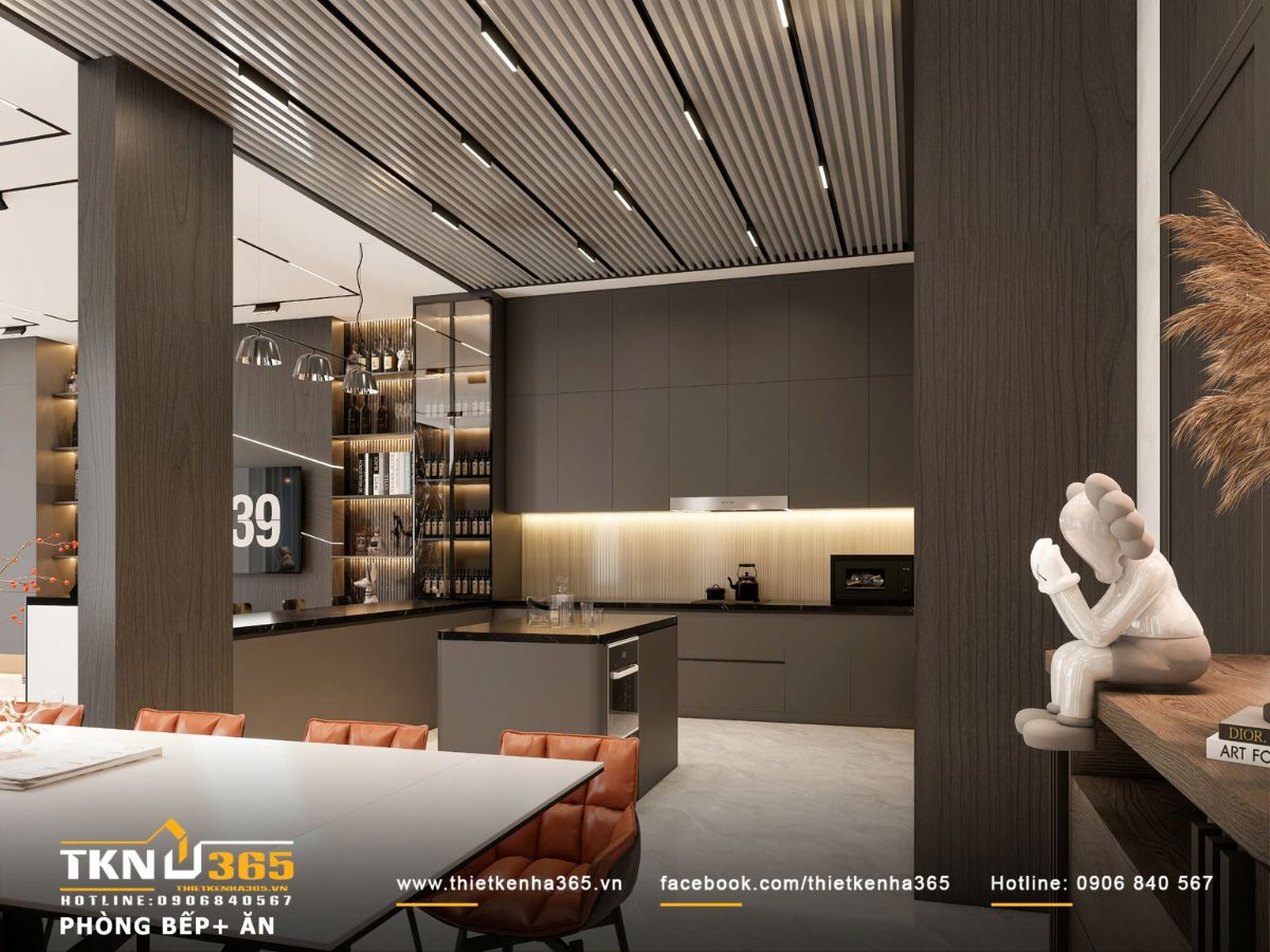 Phần trần kết hợp dải đèn LED tuyến tính mang lại hiệu ứng ánh sáng kéo dài, giúp không gian bếp trở nên sâu và có nhịp điệu hơn