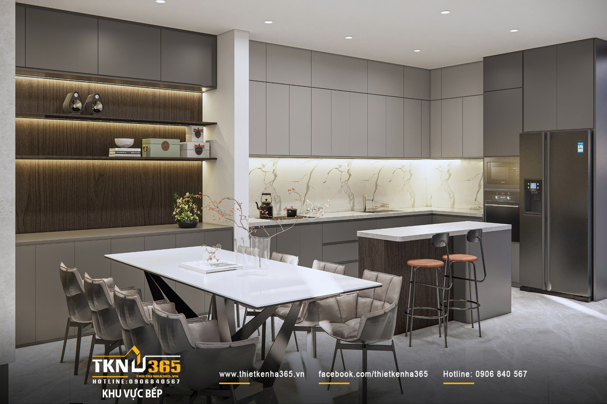 Thiết kế nội thất biệt thự hiện đại 1 trệt 2 lầu ở Bình Tân | Nhà Chị Hương 7 Tủ bếp chữ L kết hợp đảo bếp trung tâm giúp tối ưu công năng, đồng thời đóng vai trò như quầy bar hiện đại