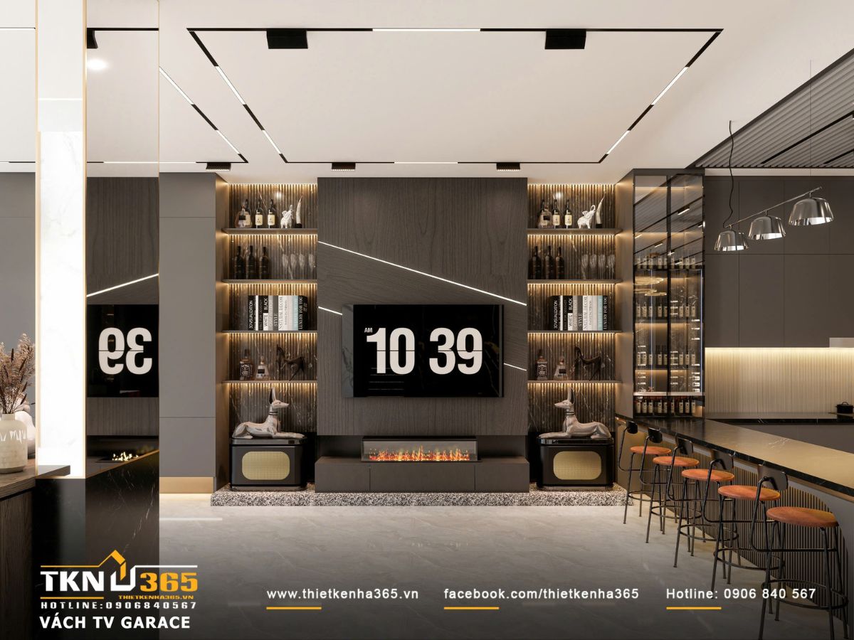 Vách TV ốp gỗ tối kết hợp hệ kệ kính và đèn hắt tạo chiều sâu, ánh sáng gián tiếp giúp không gian luôn ấm và có điểm nhấn rõ ràng