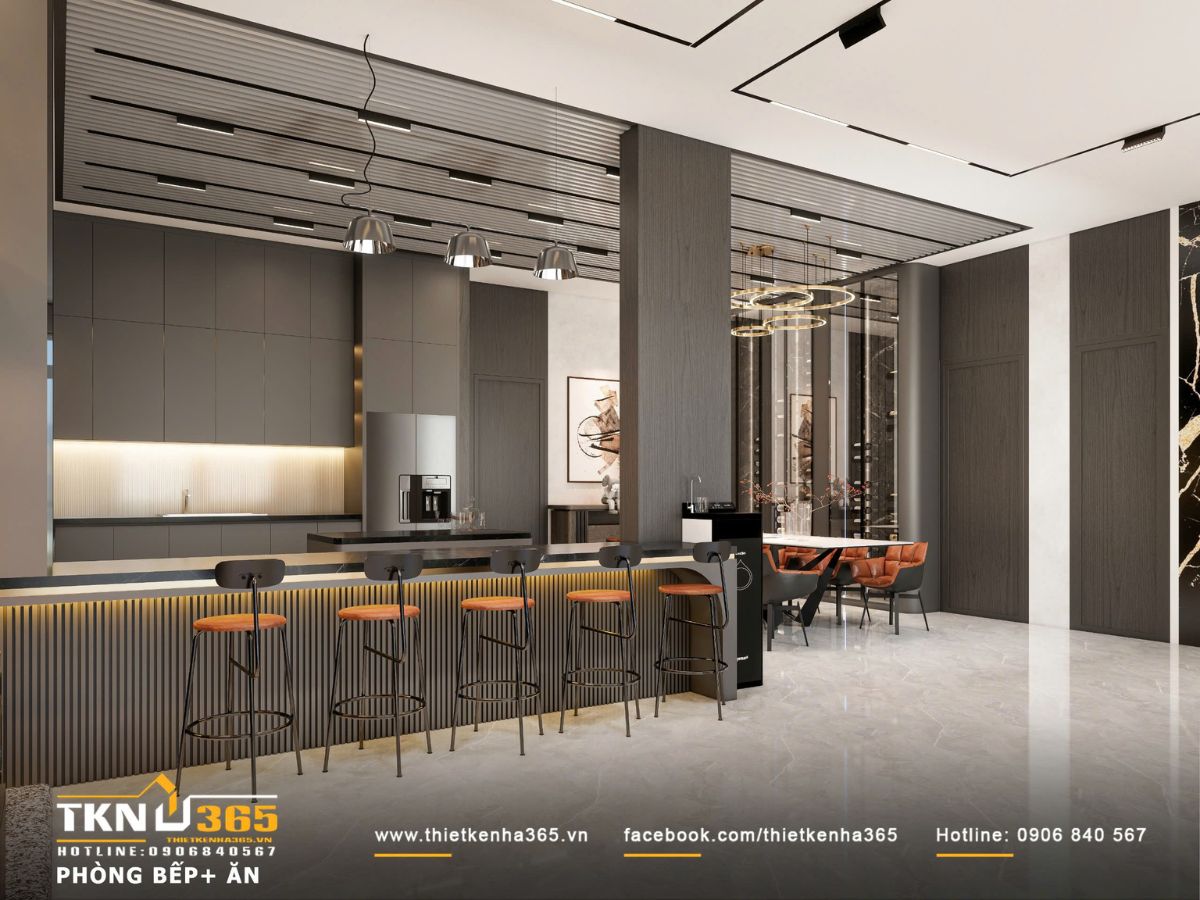 Quầy bar sử dụng lam gỗ kết hợp ánh sáng hắt tạo chiều sâu, hệ đèn thả giúp định hình rõ khu vực chức năng