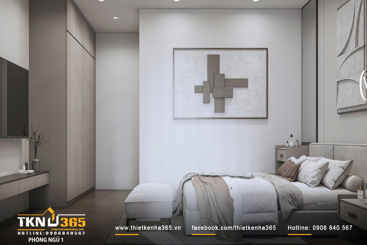 Hệ tủ kịch trần chạy dọc theo tường giúp tối ưu lưu trữ, bề mặt phẳng và màu trung tính giữ cho không gian luôn ngăn nắp, liền mạch
