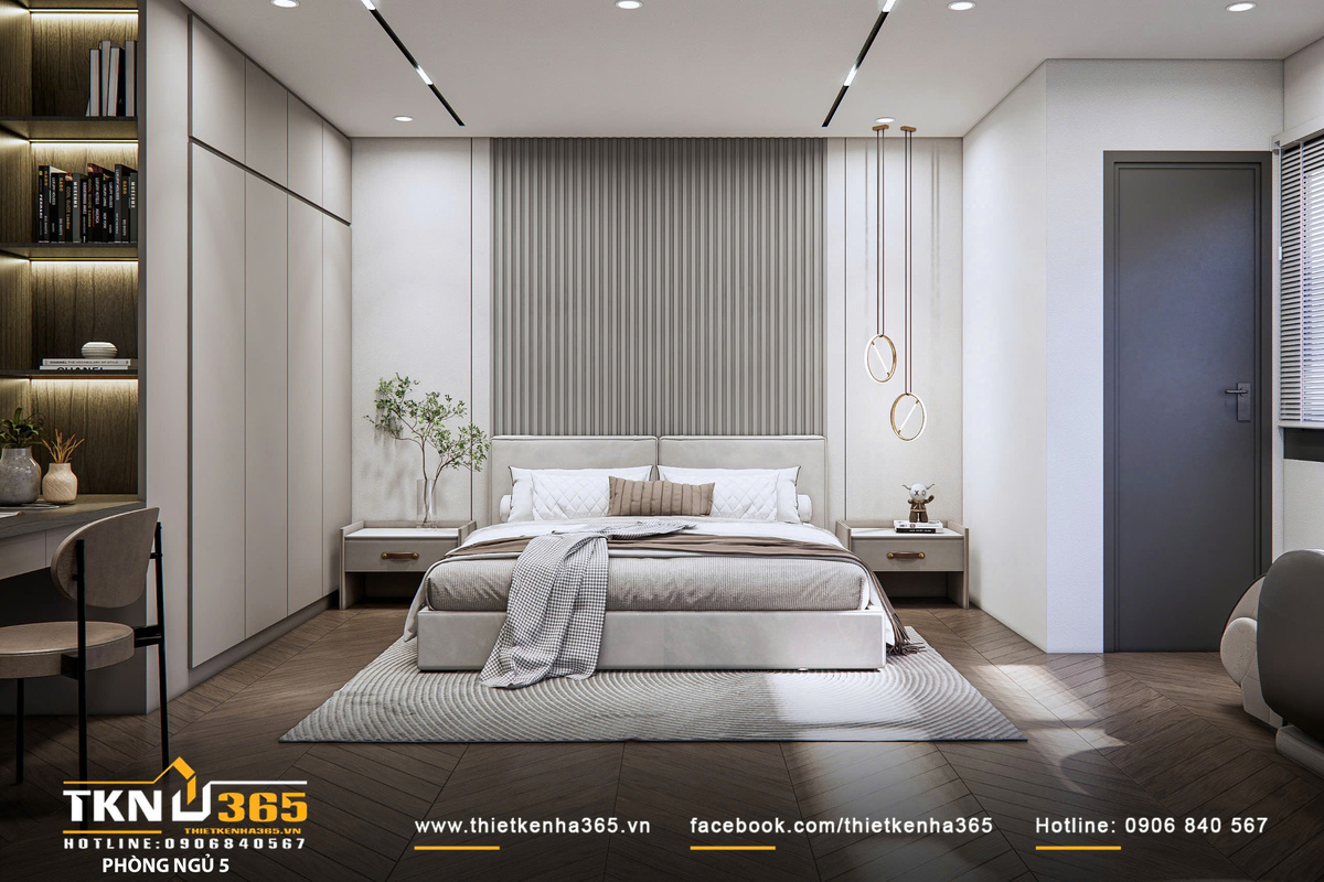 Giường ngủ đặt ở vị trí trung tâm gây ấn tượng với mảng ốp nan dọc phía sau giúp tạo nhịp điệu thị giác, làm mềm không gian bằng bảng màu be - kem dịu nhẹ