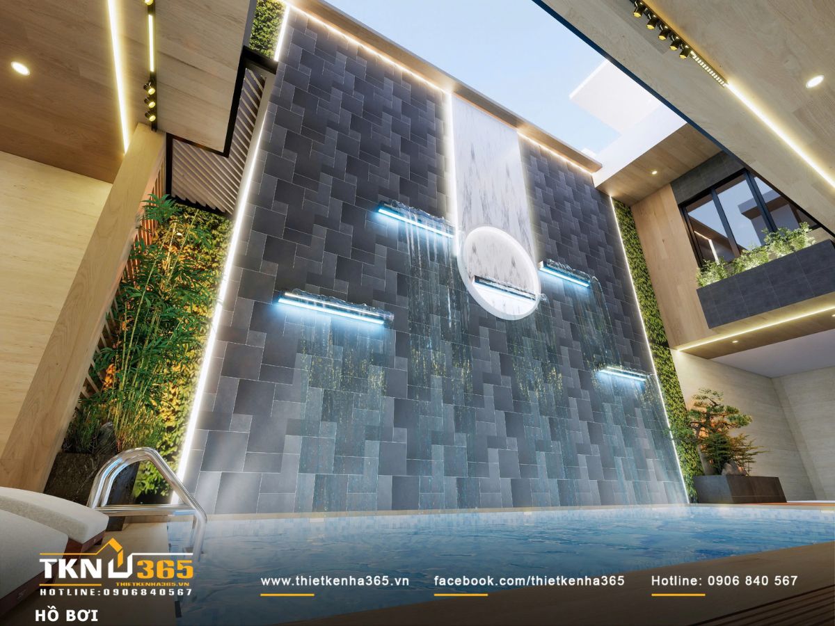 Sự cân bằng giữa vật liệu cứng và mảng xanh giúp tổng thể thiết kế nội thất biệt thự phố 2 tầng luôn giữ được nhịp thở ổn định
