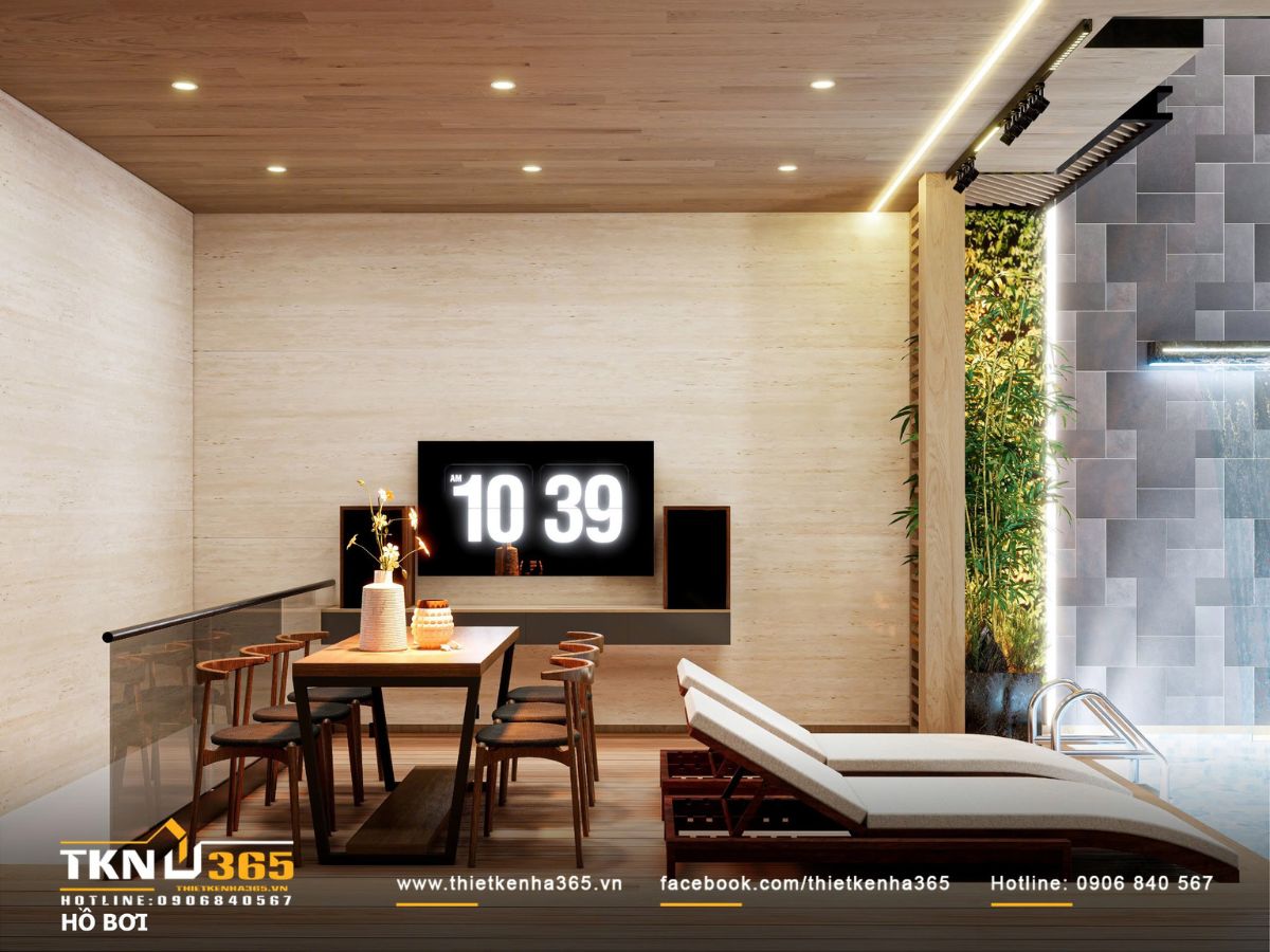 Khu vực nghỉ cạnh hồ bơi duy trì bảng màu trung tính, kết hợp gỗ ngoài trời để giữ cảm giác ấm áp và thư giãn