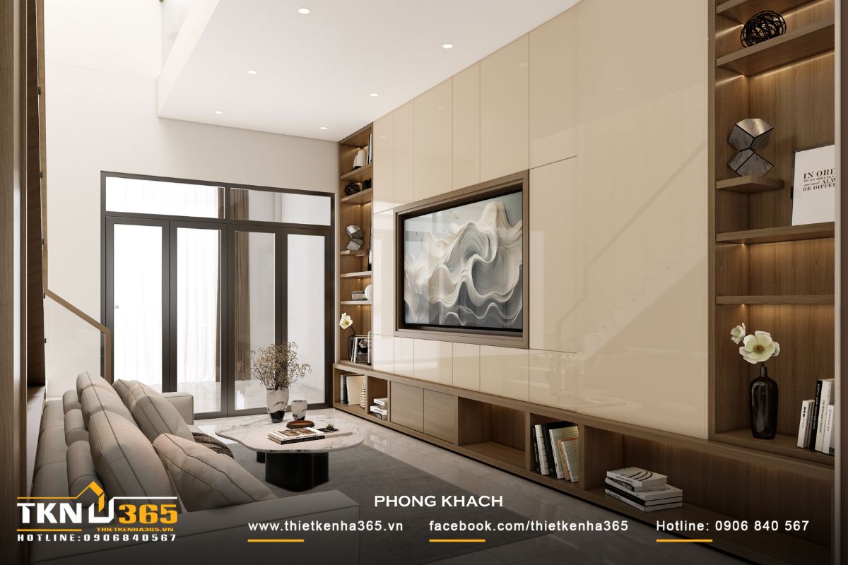 Thiết kế nội thất nhà phố 1 trệt 1 lầu: Lời giải cho không gian vừa ở vừa kinh doanh 18 Hệ vách tivi xử lý phẳng và liền mạch, kết hợp cùng kệ thấp và các ô trang trí âm tường, tạo nên tổng thể gọn gàng và có chiều sâu