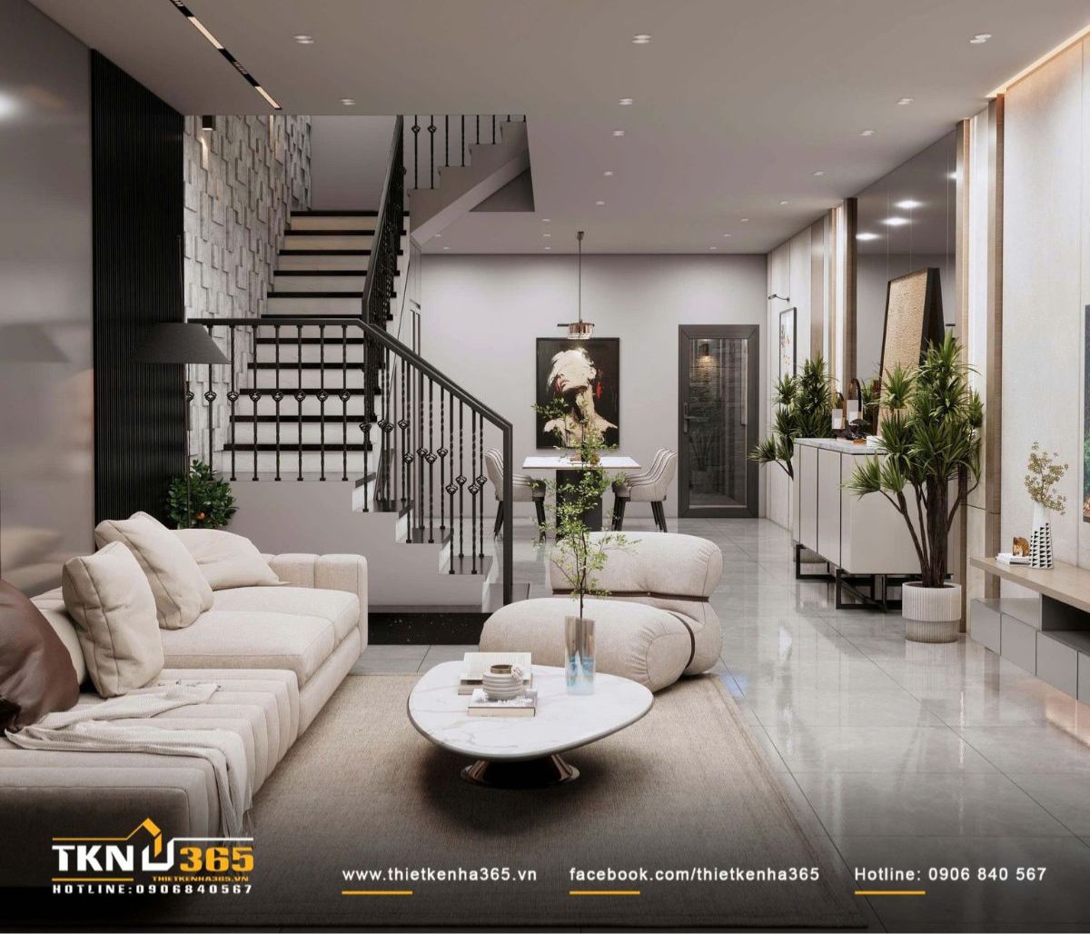 Nhà ống hẹp ngang bố trí cầu thang giữa nhà giúp giảm bí bách, tăng kết nối giữa các khu vực chức năng