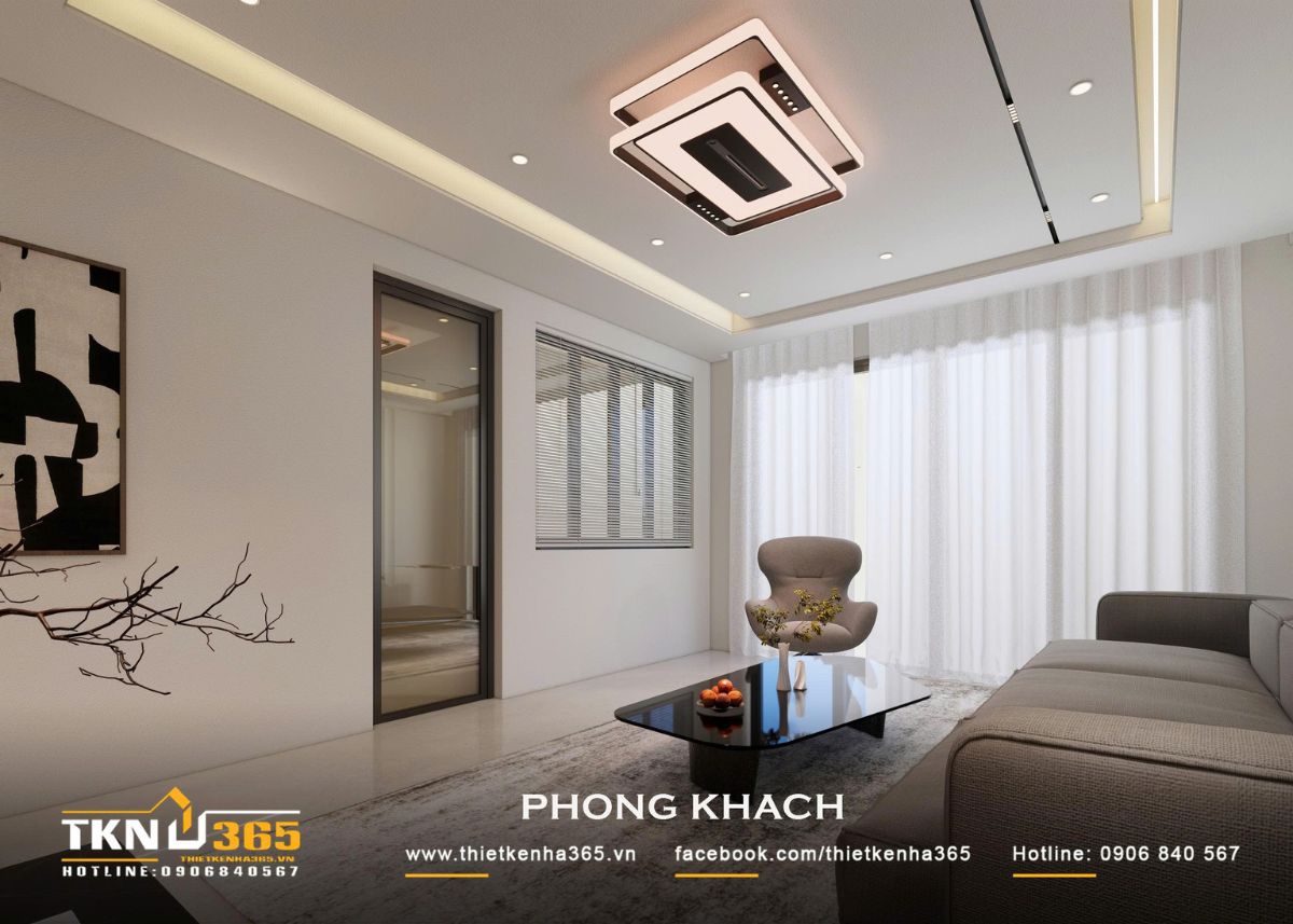 Hệ đèn âm trần và đèn hắt chạy quanh trần bổ sung ánh sáng dịu cho không gian phòng khách