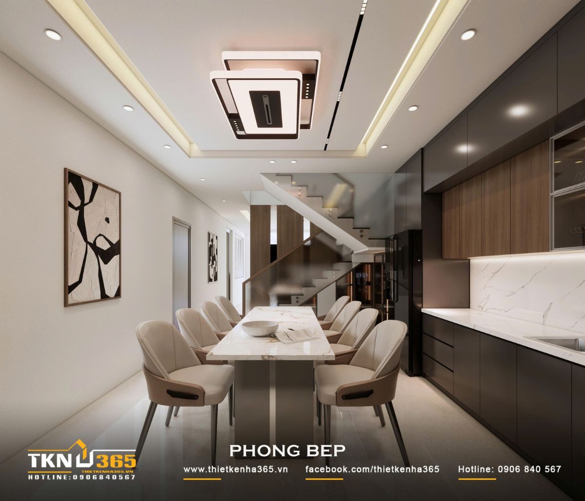 Khu bếp - ăn nhà phố 2 tầng bố trí liền mạch, giữ khoảng lưu thông rộng giữa bàn ăn và hệ tủ bếp