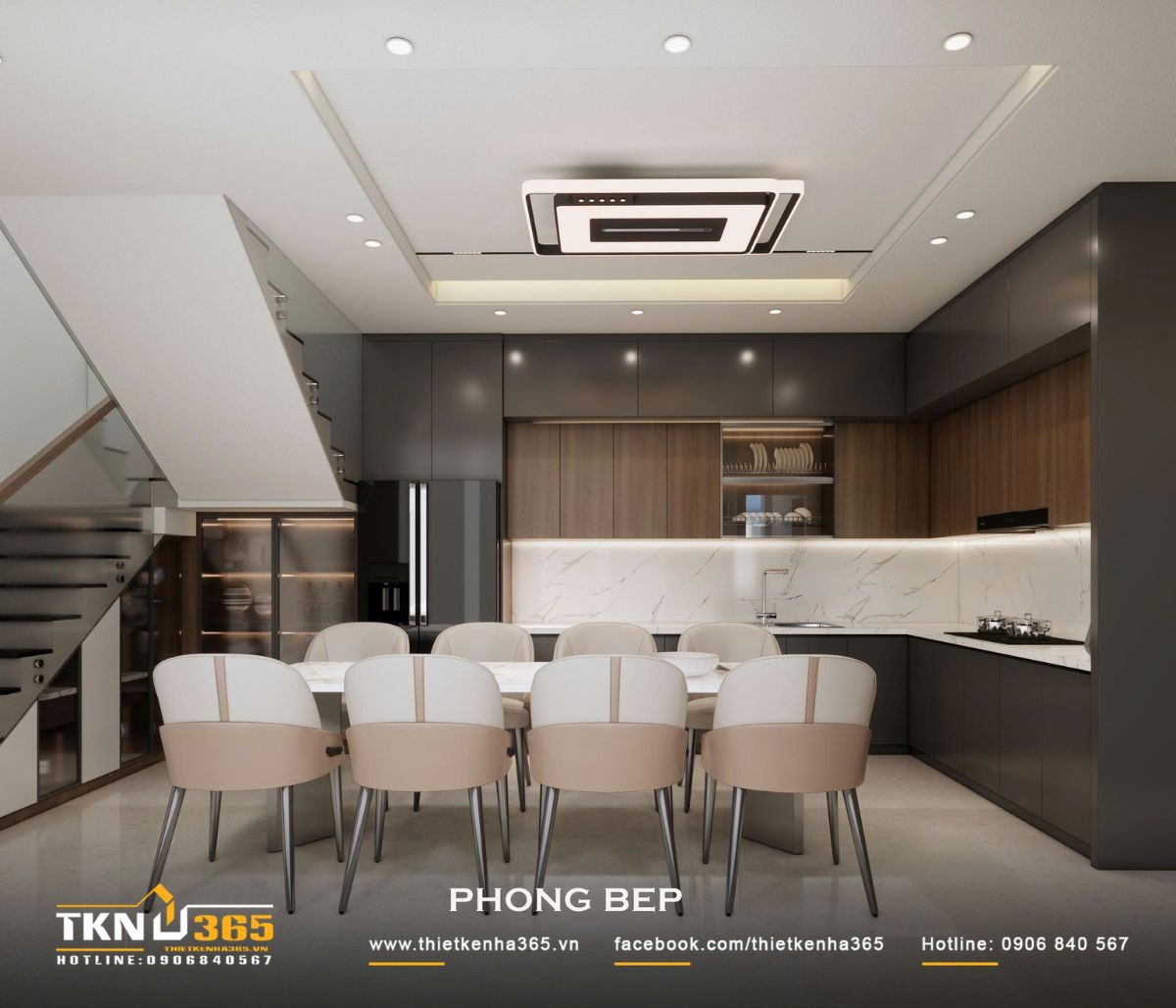 Hệ tủ bếp chữ L kết hợp tủ cao sát trần giúp tăng đáng kể diện tích lưu trữ cho không gian bếp
