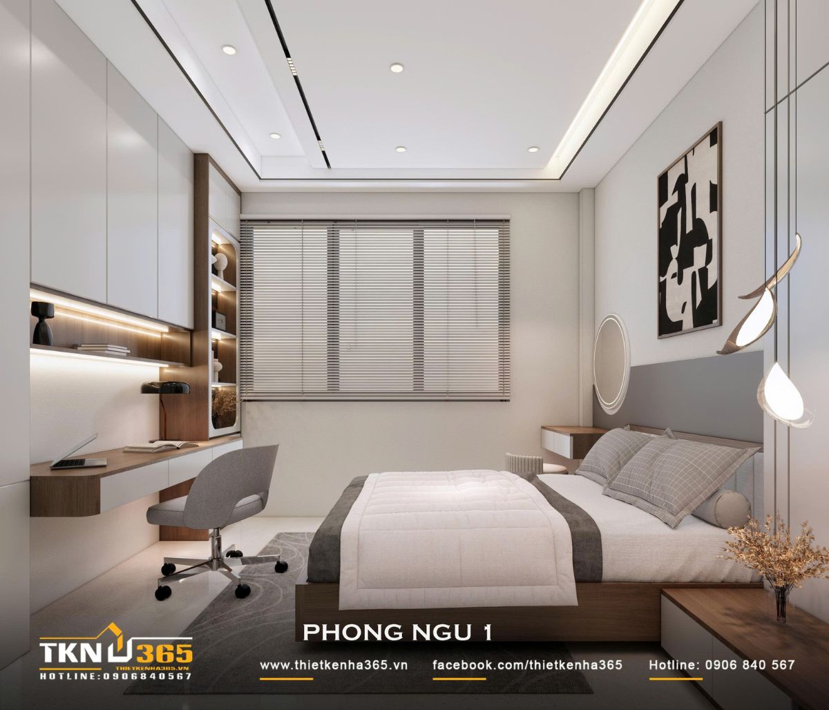 Bàn làm việc được bố trí sát tường và liên kết với hệ tủ, giúp khai thác diện tích phòng ngủ hiệu quả hơn