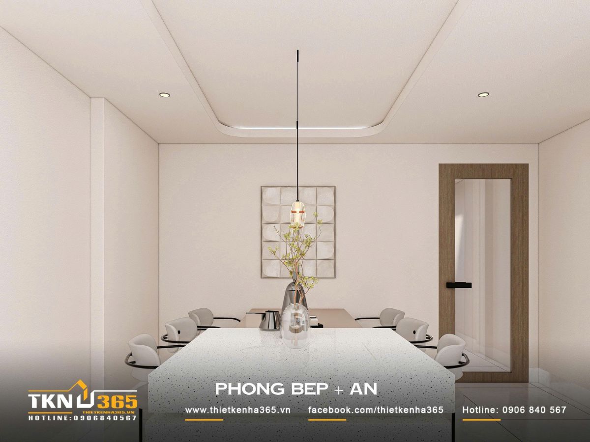 Nhà phố 3 tầng 4,1x14,5m ở Hóc Môn - Gói ghém những mong muốn giản dị trong một mái nhà 10 Đảo bếp mặt đá sáng màu kết nối với bàn ăn, giúp không gian bếp nhà phố 3 tầng có thêm diện tích chuẩn bị thực phẩm và thuận tiện cho những bữa cơm gia đình
