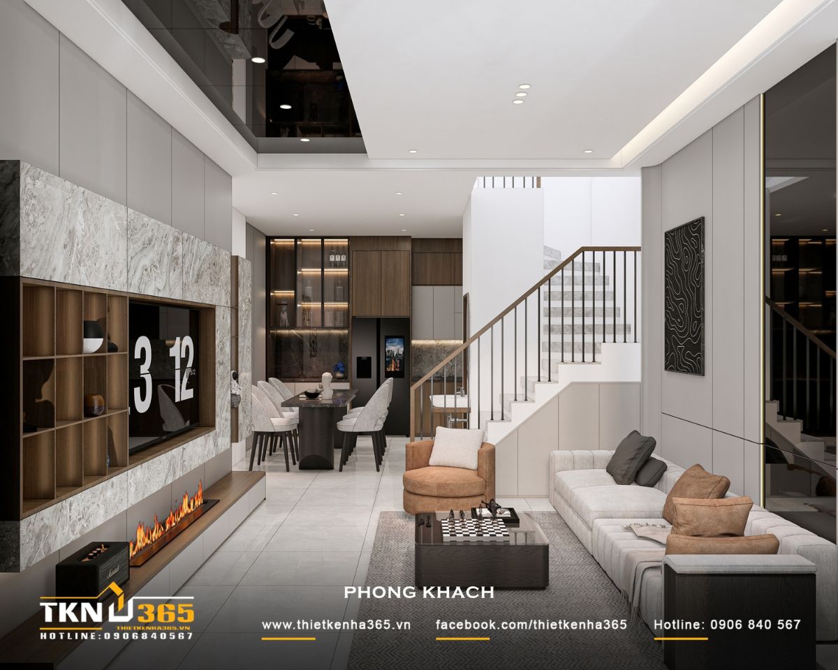 Nhà phố 3 tầng B’S House giữ sự riêng tư trong từng khoảng mở 11 Phòng khách và bếp ăn nhà phố 3 tầng được tổ chức liên thông, kết hợp cầu thang sát một bên để giữ tầm nhìn thoáng và thuận tiện di chuyển