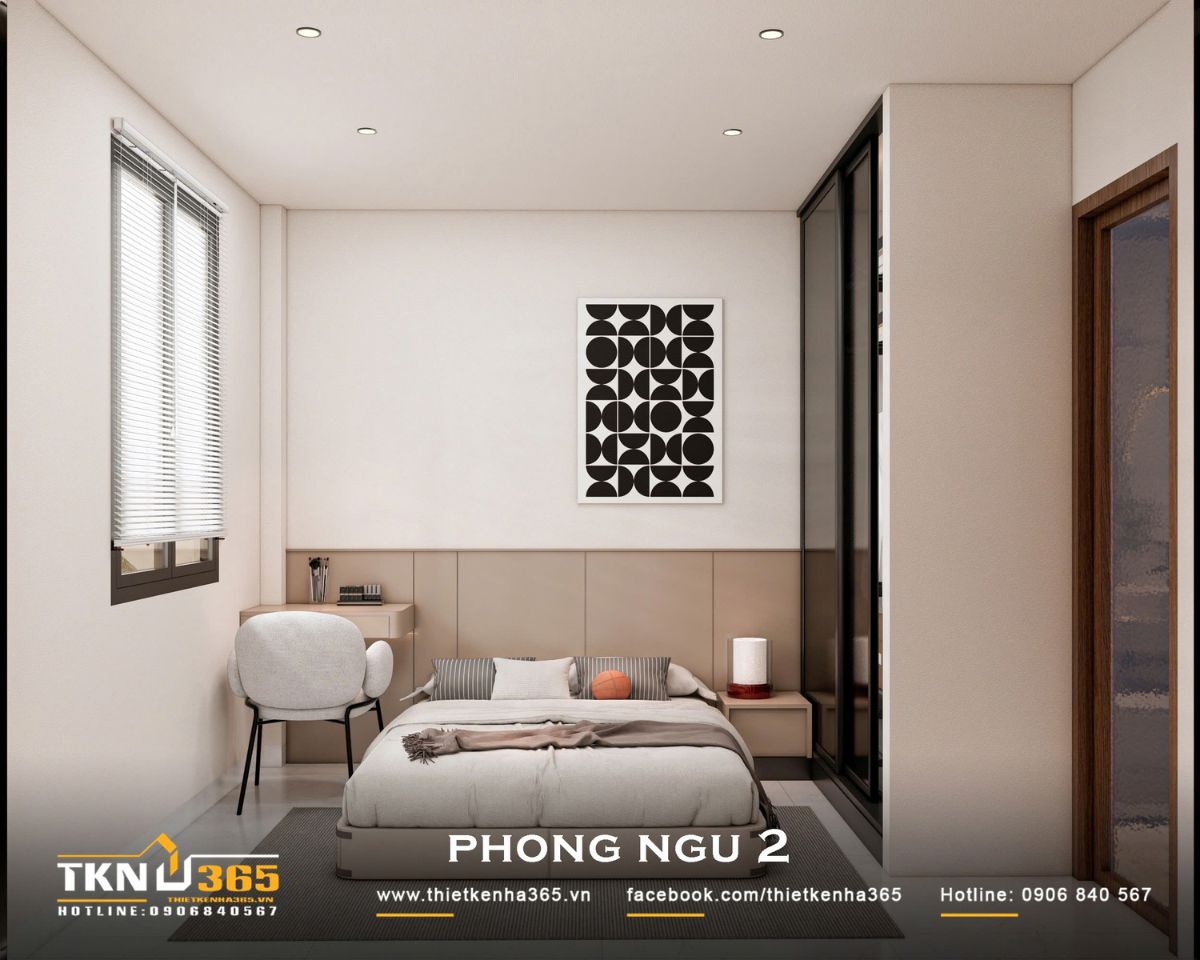 Nhà phố 3 tầng 4,1x14,5m ở Hóc Môn - Gói ghém những mong muốn giản dị trong một mái nhà 13 Phòng ngủ 2 nhà phố 3 tầng bố trí giường ở trung tâm, bàn làm việc cạnh cửa sổ và tranh hình học tạo nét hiện đại cho không gian nghỉ ngơi