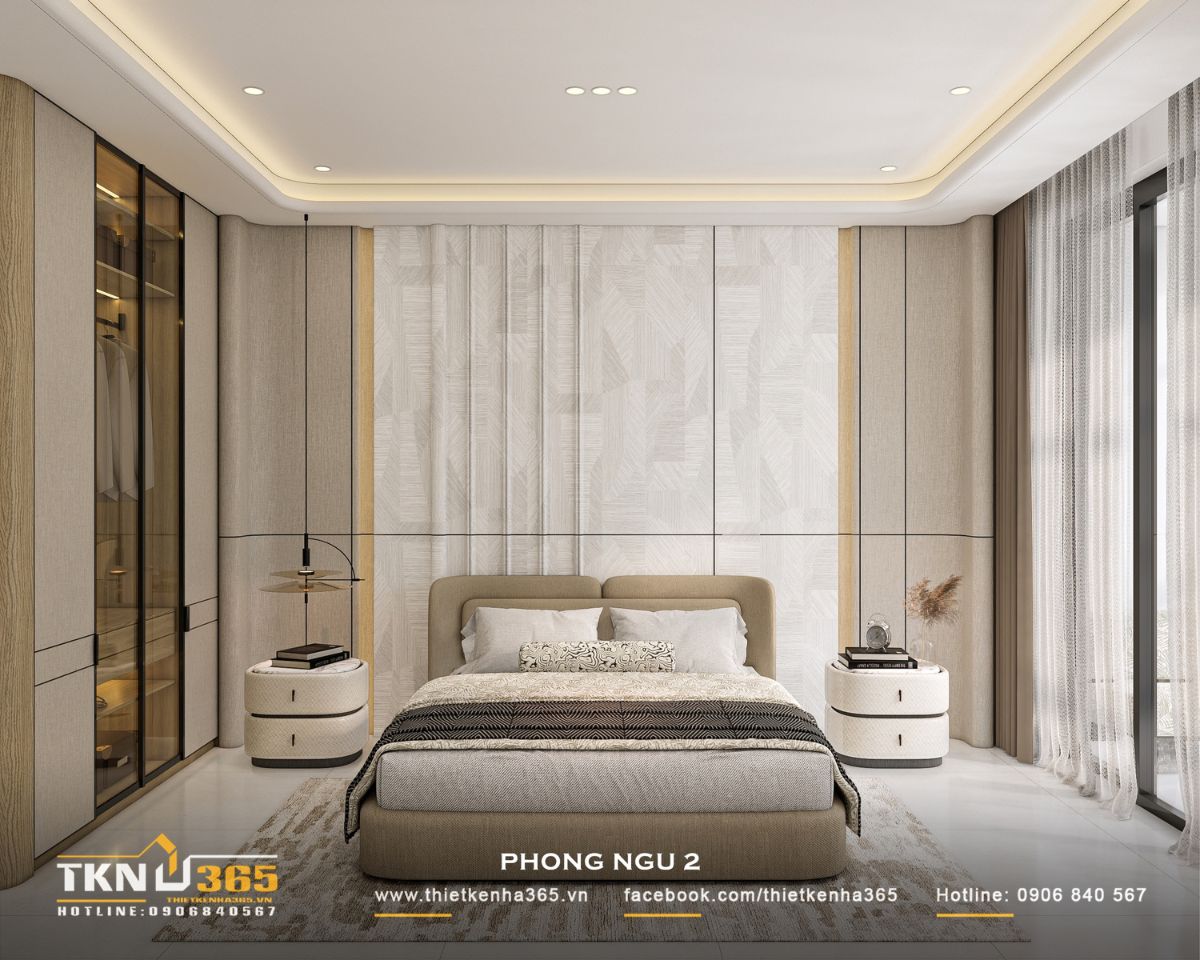Phòng ngủ 2 mang phong cách hiện đại với giường bọc nệm, tủ đầu giường bo tròn và ánh sáng hắt trần dịu nhẹ