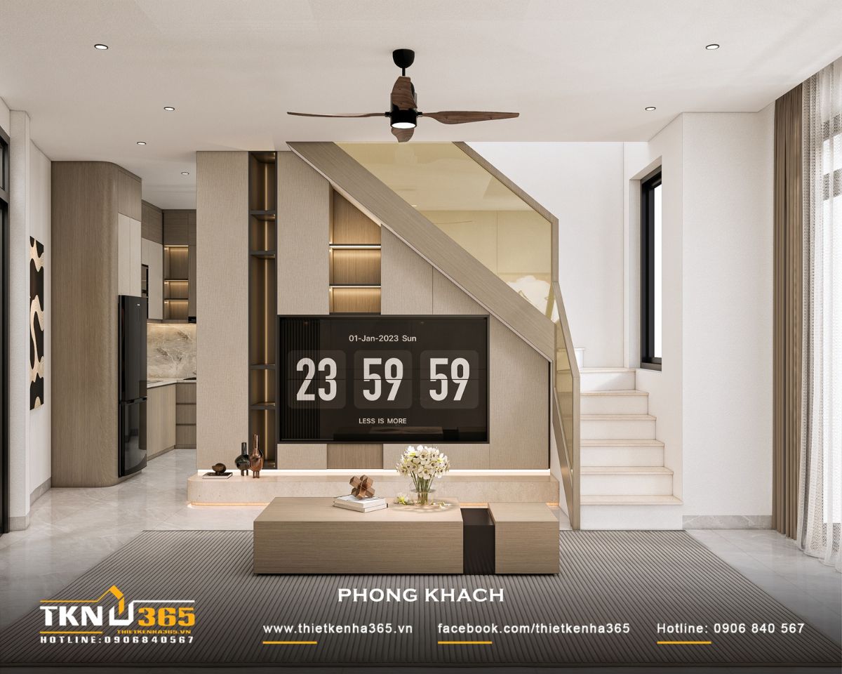 Nhà phố 4 tầng 3x8m ở Hóc Môn: Chắt chiu từng mét vuông cho tổ ấm đủ đầy 15 Khoảng dưới cầu thang nhà phố 4 tầng được tận dụng làm hệ TV kết hợp tủ và kệ trang trí, tiết kiệm diện tích sàn