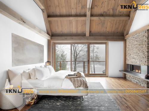 Phòng ngủ đơn giản có phần gạch thô kết hợp sàn và trần gỗ